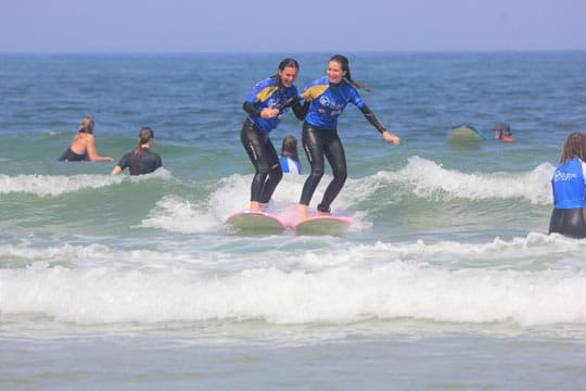 Surf lessons at the junior surf camp on the beach of Moliets-Plage
