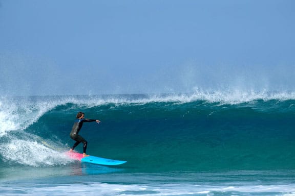 Surf instructor from France surfs green wave