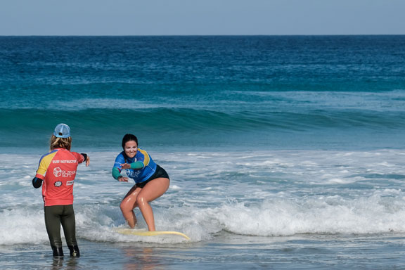 Surf lesson for beginners with small waves