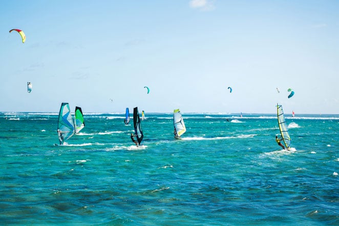 In many surf schools you can also learn windsurfing