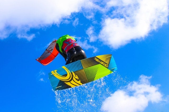 Kitesurfboard from below during a jump in the water