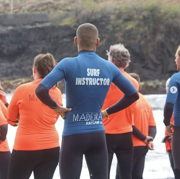 A surf instructor at a surf lesson in Madeira