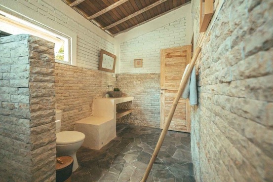 The bathrooms at the Bali Surf Camp are also designed in Balinese style